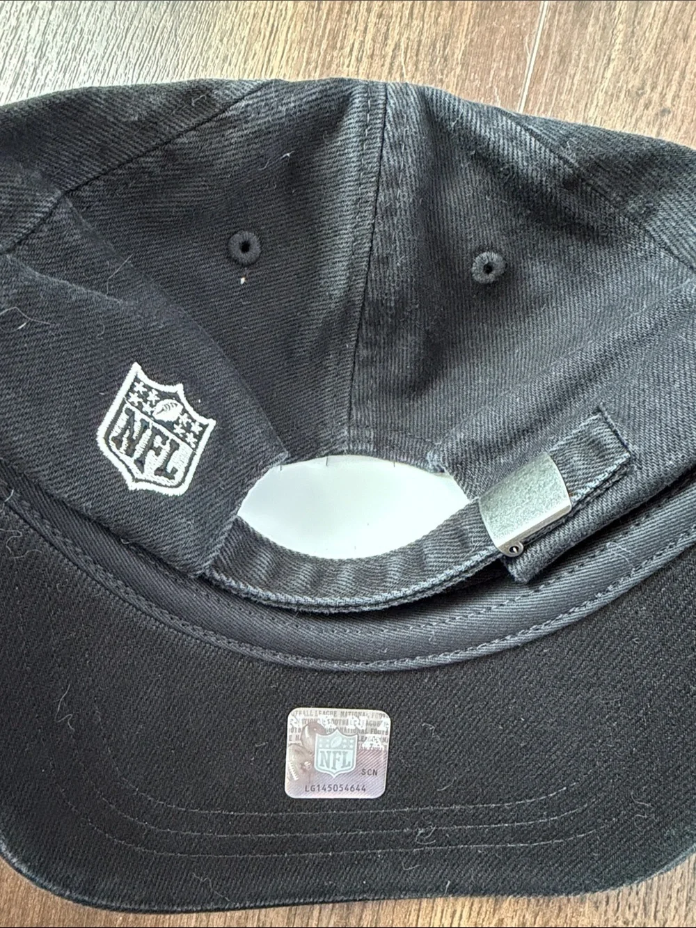 NFL Black Adjustable Hat with Embroidered Shield